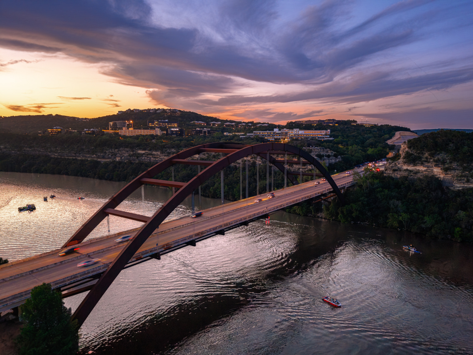 Pennybacker 360 Bridge over Lake Austin at dusk — drone photography